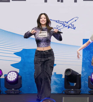 H1-KEY’s Yel also carries on tradition, performs wearing an ‘anime titties’ top